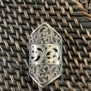 Lois hill long time famous designer of silver using LH scroll sterling silver.